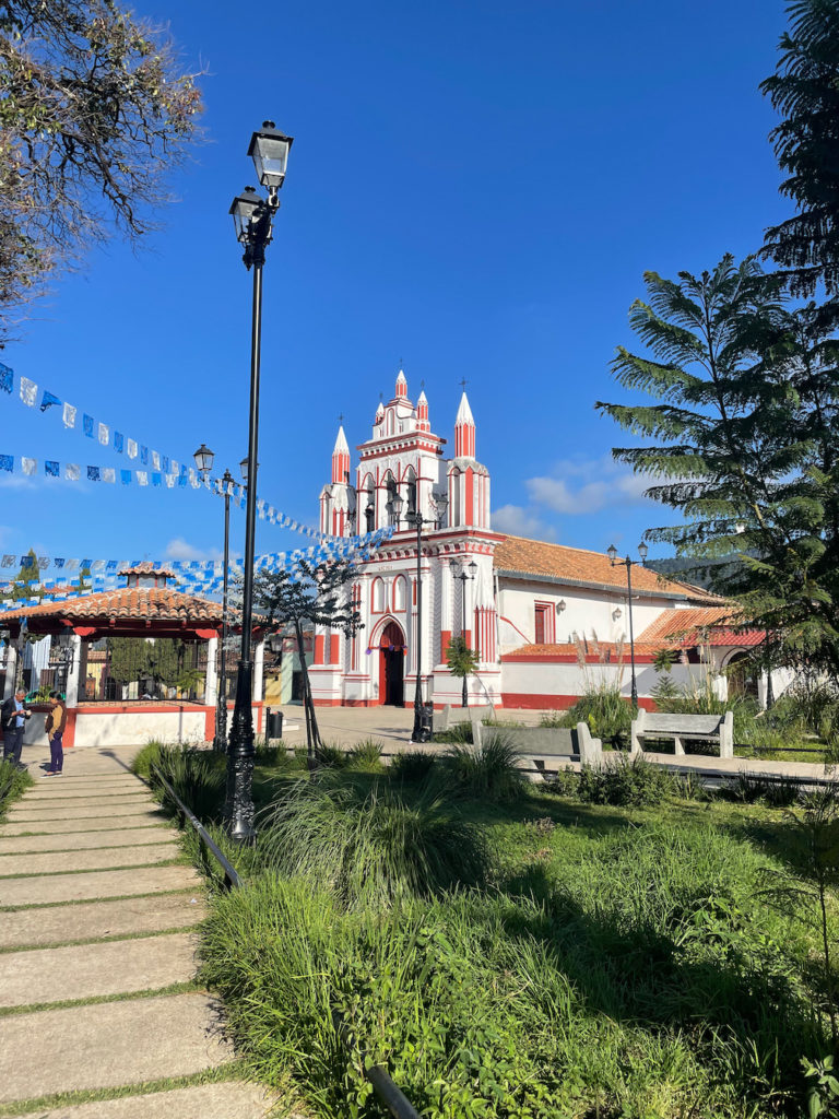 A white and red church in San Cristobal. 